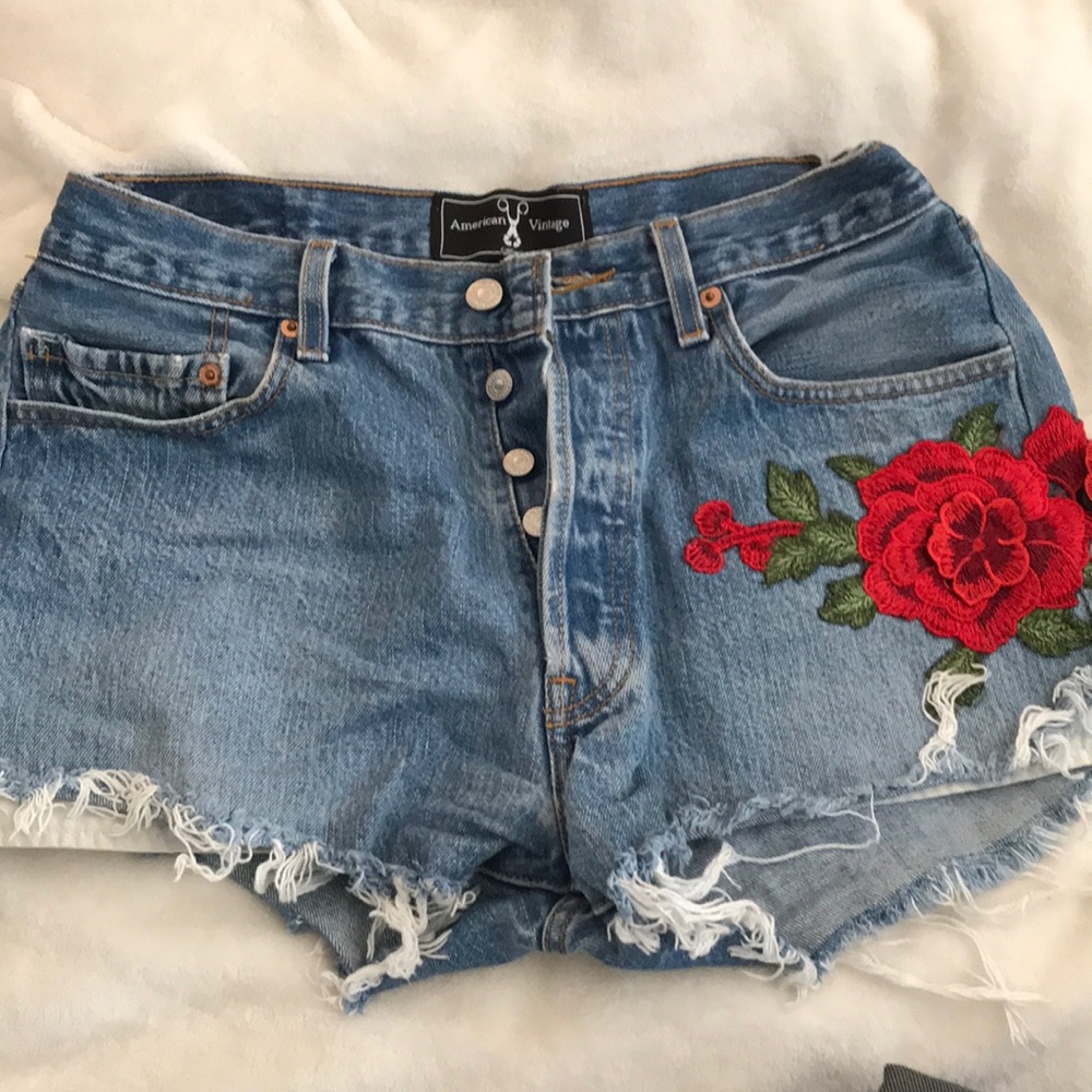denim shorts w rose embellishment